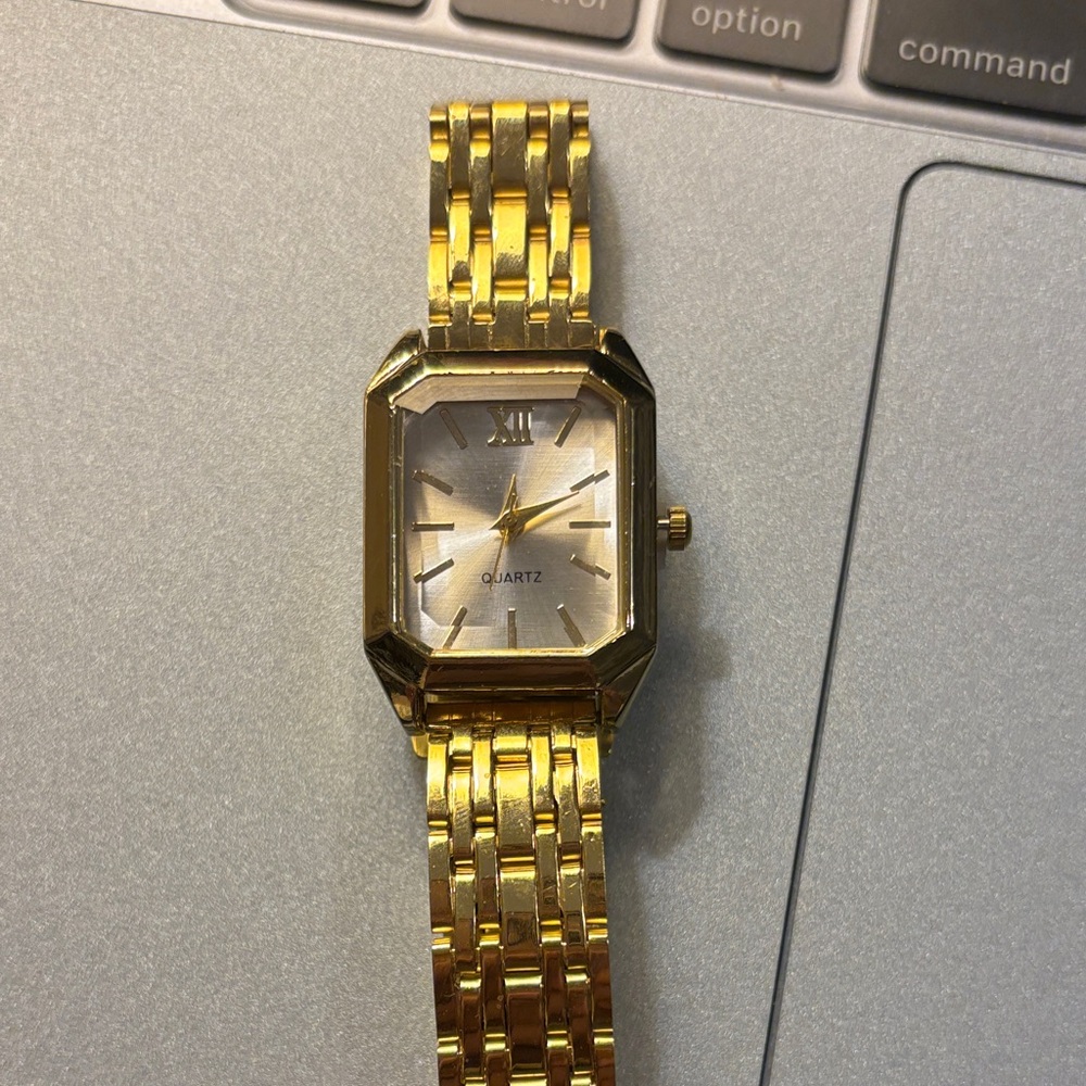 Gold Quartz Watch with Silver Face
